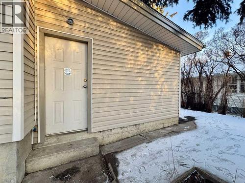Super Single Attached Garage - 718 10 Street S, Lethbridge, AB - Outdoor With Exterior