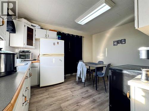 Kitchen and Dining Area - 718 10 Street S, Lethbridge, AB - Indoor Photo Showing Kitchen