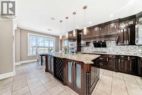 115 Wentworth Hill Sw, Calgary, AB - Indoor Photo Showing Kitchen With Upgraded Kitchen