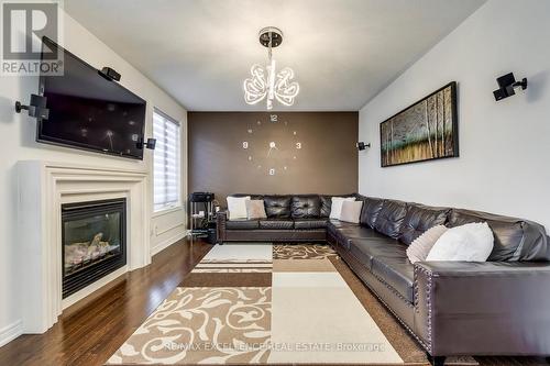 9 Natronia Trail, Brampton, ON - Indoor Photo Showing Living Room With Fireplace