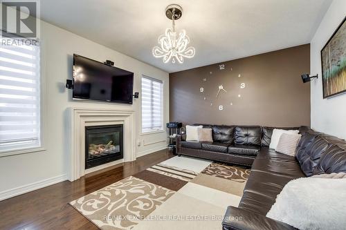 9 Natronia Trail, Brampton, ON - Indoor Photo Showing Living Room With Fireplace