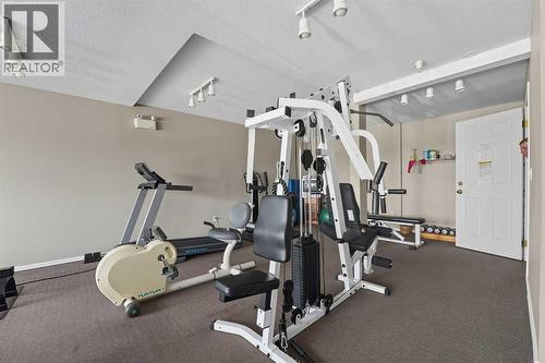 208, 6118 53 Avenue, Red Deer, AB - Indoor Photo Showing Gym Room