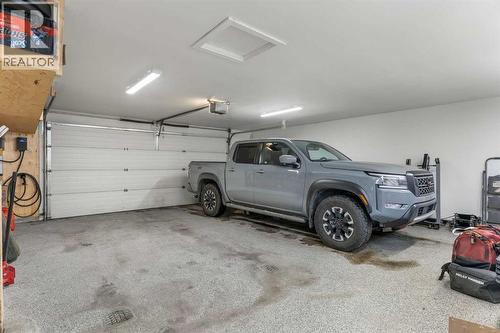 9936 Maplecreek Drive Se, Calgary, AB - Indoor Photo Showing Garage