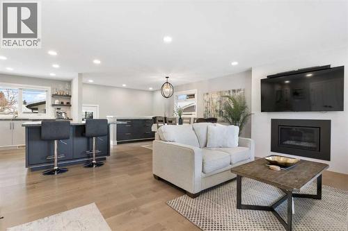 9936 Maplecreek Drive Se, Calgary, AB - Indoor Photo Showing Living Room With Fireplace