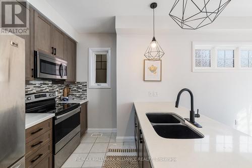 #45 - 1169 Garner Road E, Hamilton, ON - Indoor Photo Showing Kitchen With Double Sink With Upgraded Kitchen