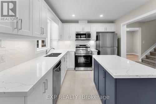 8329 Atack Court, Niagara Falls (Ascot), ON - Indoor Photo Showing Kitchen With Stainless Steel Kitchen With Double Sink With Upgraded Kitchen