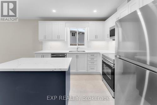 8329 Atack Court, Niagara Falls (Ascot), ON - Indoor Photo Showing Kitchen With Stainless Steel Kitchen With Upgraded Kitchen