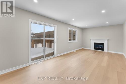 8329 Atack Court, Niagara Falls (Ascot), ON - Indoor Photo Showing Other Room With Fireplace