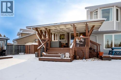 Rear Elevation - 327 Millview Place Sw, Calgary, AB - Outdoor With Deck Patio Veranda With Exterior