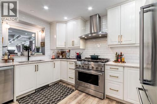 327 Millview Place Sw, Calgary, AB - Indoor Photo Showing Kitchen With Upgraded Kitchen