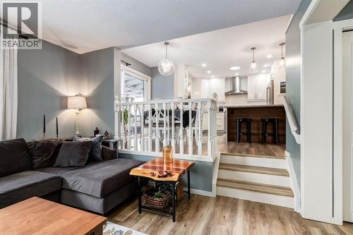 327 Millview Place Sw, Calgary, AB - Indoor Photo Showing Living Room
