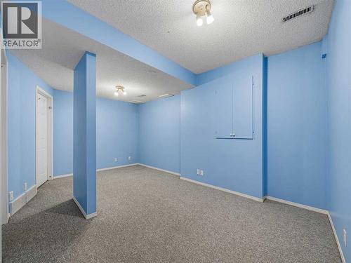 Basement Rec Room - 626 Hawkstone Manor Nw, Calgary, AB - Indoor Photo Showing Other Room