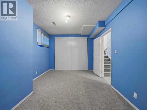 Basement Bedroom 4 - 626 Hawkstone Manor Nw, Calgary, AB - Indoor Photo Showing Other Room