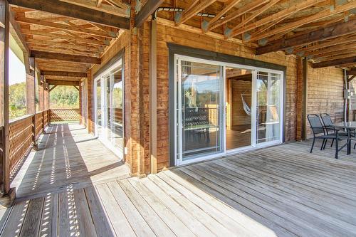 Extérieur - 6901 Boul. Martel, Saint-Honoré, QC - Outdoor With Deck Patio Veranda With Exterior