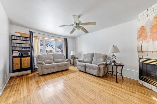 Salon - 88 Rue Carlyle O., Châteauguay, QC - Indoor Photo Showing Living Room With Fireplace