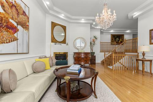 Salle familiale - 241 Rue Dali, Dollard-Des-Ormeaux, QC - Indoor With Fireplace