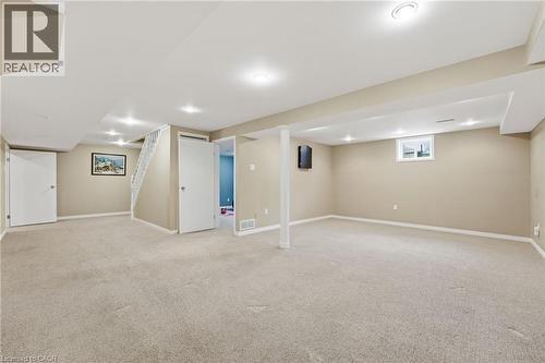 Basement open recreation space with view into office with window - 84 Chatterson Drive, Ancaster, ON - Indoor Photo Showing Basement