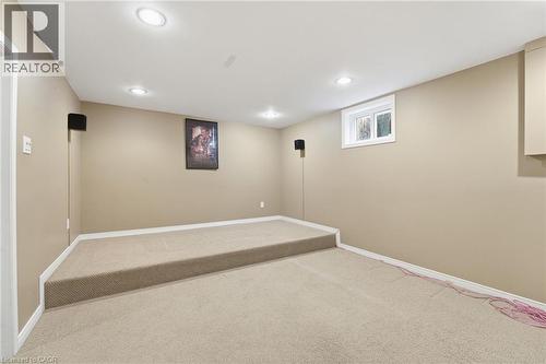Basement media room with tiered/platform seating - 84 Chatterson Drive, Ancaster, ON - Indoor