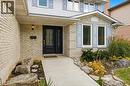 Entry with concrete walkway and landscaped garden - 84 Chatterson Drive, Ancaster, ON  - Outdoor 
