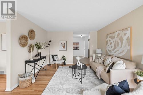 Hardwood throughout the living/dining space - 968 Walkley Road, Ottawa, ON - Indoor Photo Showing Living Room