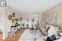 Hardwood throughout the living/dining space - 