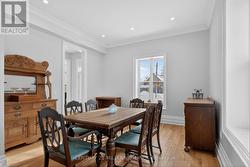 Formal dining rm. with hardwood floors, pot lights - 