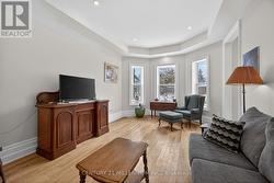 Lovely living room with bay window, pot lighting - 