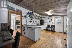 Separate room off the kitchen with 2 access doors - 