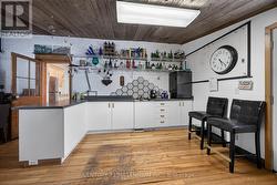 Sink, back storage room & RI for future bathroom. - 