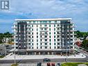 204 - 118 West Street, Port Colborne (Sugarloaf), ON  - Outdoor With Balcony With Facade 