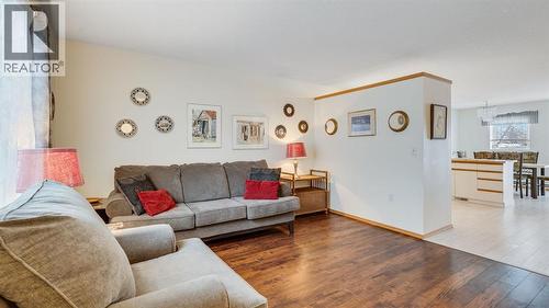 Bright space - 42, 105 Elm Place, Okotoks, AB - Indoor Photo Showing Living Room