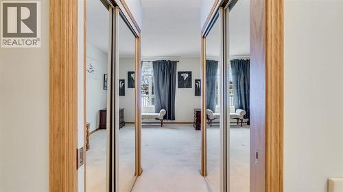 Tons of closet space - 42, 105 Elm Place, Okotoks, AB - Indoor Photo Showing Other Room