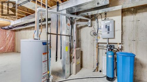 42, 105 Elm Place, Okotoks, AB - Indoor Photo Showing Basement