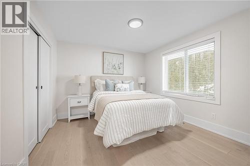 Bedroom with light wood finished floors and a closet - 248 Wales Crescent, Oakville, ON - Indoor Photo Showing Bedroom