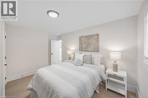 2nd Bedroom featuring baseboards and light wood-style floors - 248 Wales Crescent, Oakville, ON - Indoor Photo Showing Bedroom