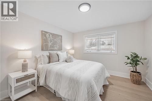 Bedroom with baseboards and light wood finished floors - 248 Wales Crescent, Oakville, ON - Indoor Photo Showing Bedroom