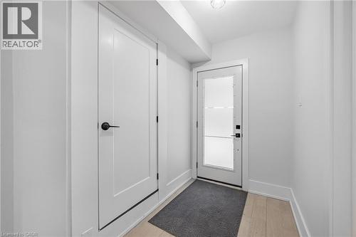 Mudroom with baseboards and light wood-style floors - 248 Wales Crescent, Oakville, ON - Indoor Photo Showing Other Room