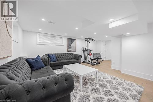 Living room with light wood-type flooring and recessed lighting - 248 Wales Crescent, Oakville, ON - Indoor