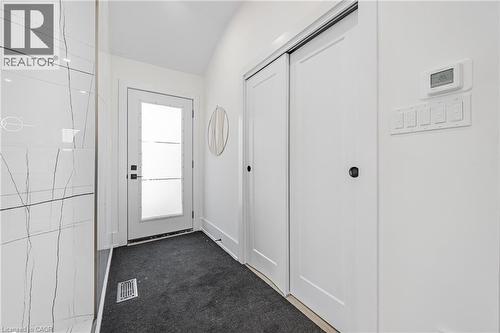 Entryway with carpet and lofted ceiling - 248 Wales Crescent, Oakville, ON - Indoor Photo Showing Other Room