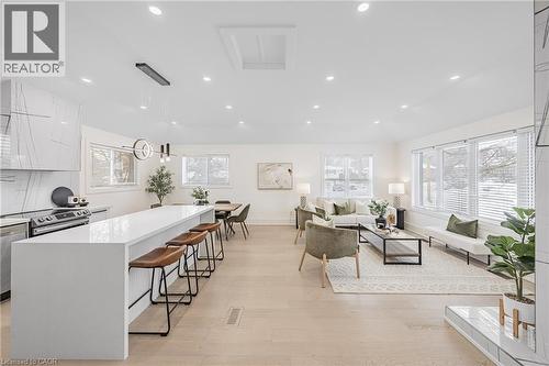Living area with recessed lighting and light wood-style flooring - 248 Wales Crescent, Oakville, ON - Indoor