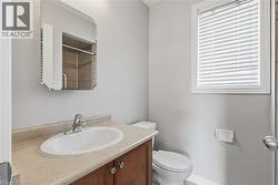 Bathroom with vanity and a shower - 