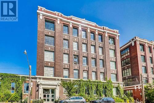102A - 245 Carlaw Avenue, Toronto, ON - Outdoor With Facade