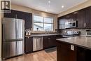 152 New Brighton Grove Se, Calgary, AB  - Indoor Photo Showing Kitchen With Double Sink 