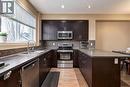 152 New Brighton Grove Se, Calgary, AB  - Indoor Photo Showing Kitchen With Double Sink 
