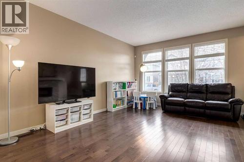 152 New Brighton Grove Se, Calgary, AB - Indoor Photo Showing Living Room