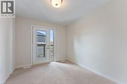 Bedroom w/ walk out to balcony - 