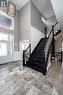 Custom Wood/Stainless Steel Staircase - 21564 Loyalist Parkway, Prince Edward County (Ameliasburg Ward), ON  - Indoor Photo Showing Other Room 