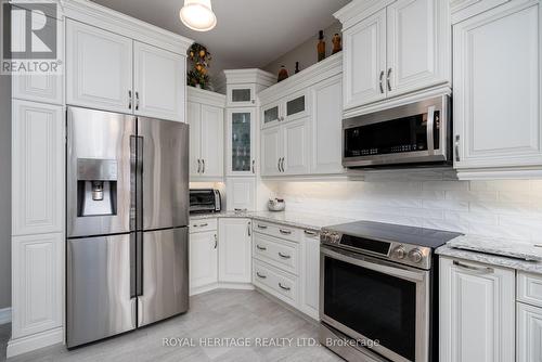 Custom Kitchen & Built in Appliances - 21564 Loyalist Parkway, Prince Edward County (Ameliasburg Ward), ON - Indoor Photo Showing Kitchen With Stainless Steel Kitchen With Upgraded Kitchen