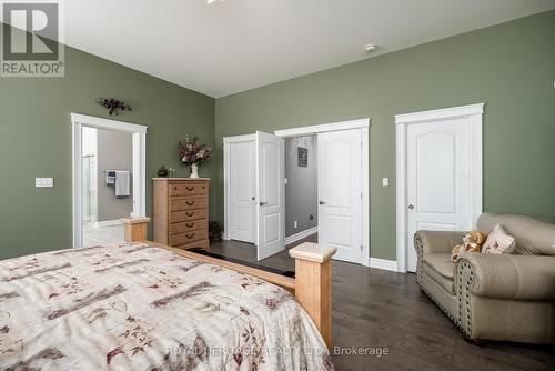 2 Walk In Closets - 21564 Loyalist Parkway, Prince Edward County (Ameliasburg Ward), ON - Indoor Photo Showing Bedroom