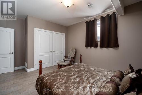 Lower Level Bedroom with Double Closet - 21564 Loyalist Parkway, Prince Edward County (Ameliasburg Ward), ON - Indoor Photo Showing Bedroom